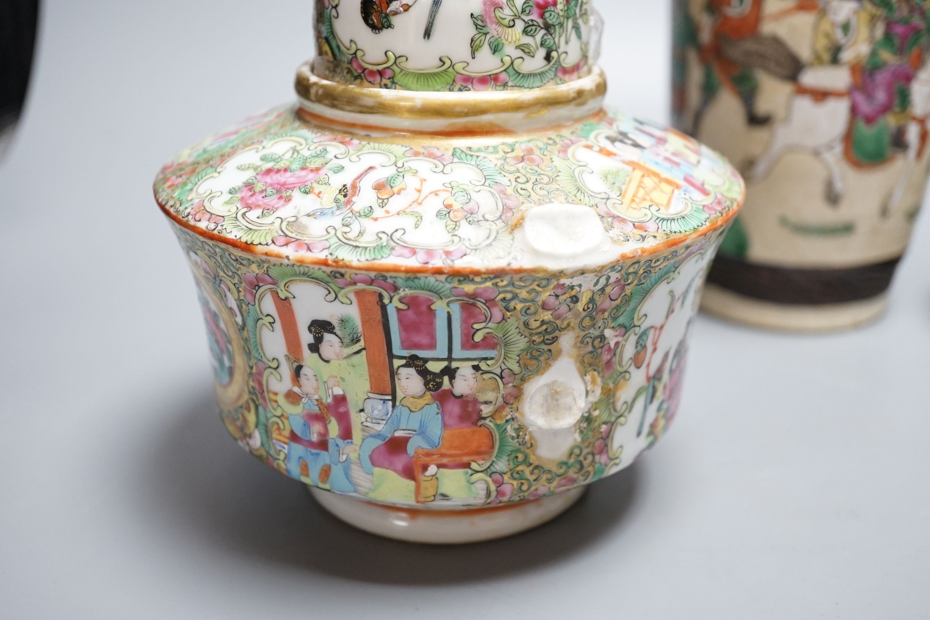 A Chinese famille rose crackleglaze vase, 29cm, together with a famille rose teapot and a crackleglaze celadon ground bottle vase